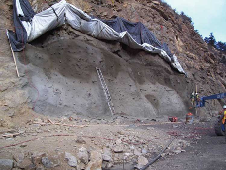 Application of the First Layer of Shotcrete on a Rock Face. Courtesy of FHWA