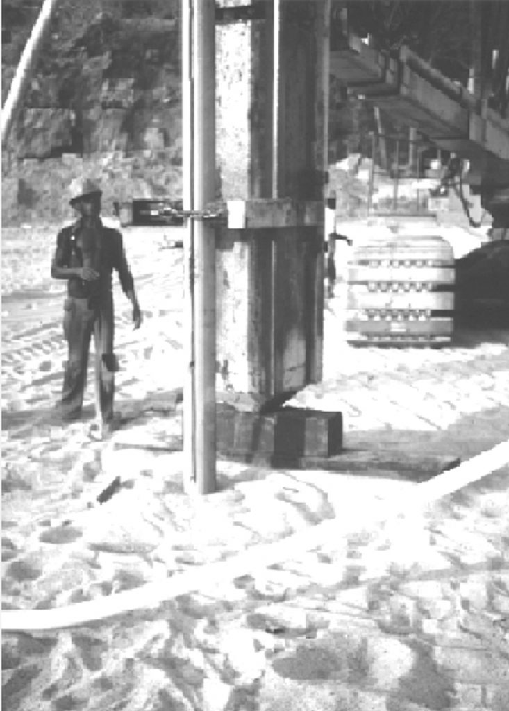 Casing and plastic tubing used for placement of explosive charges at depth for blast densification. (Photograph courtesy of James K. Mitchell.) Casing and plastic tubing used for placement of explosive charges at depth for blast densification. (Photograph courtesy of James K. Mitchell.)