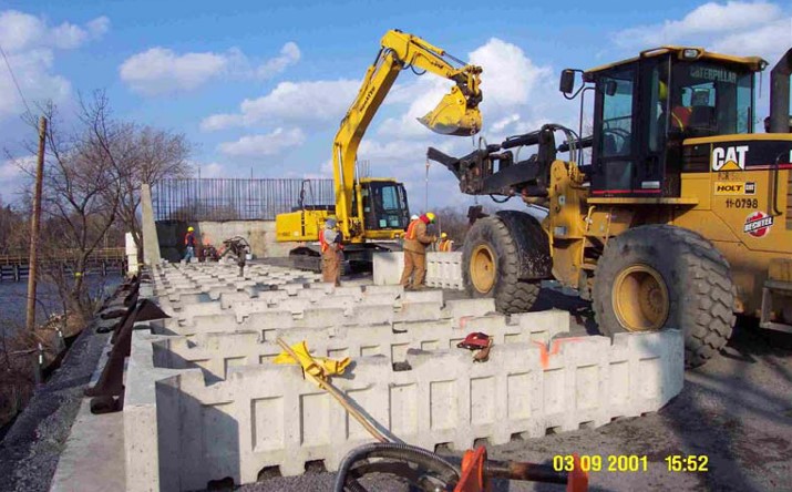 Column-supported T-Wall installation From FHWA (2004)