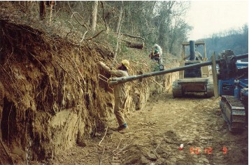 Drilling a nail hole. Courtesy FHWA.