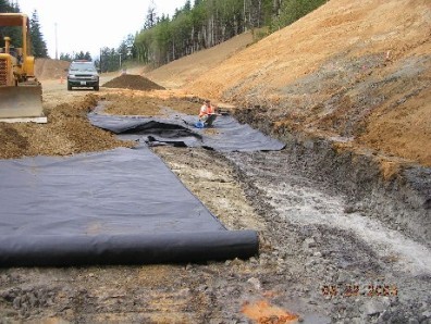 Excavation and geosynthetic placement prior to replacement, Sandlake-Galloway Road Project. Courtesy Tillamook County, Oregon. Excavation and geosynthetic placement prior to replacement, Sandlake-Galloway Road Project. Courtesy Tillamook County, Oregon.