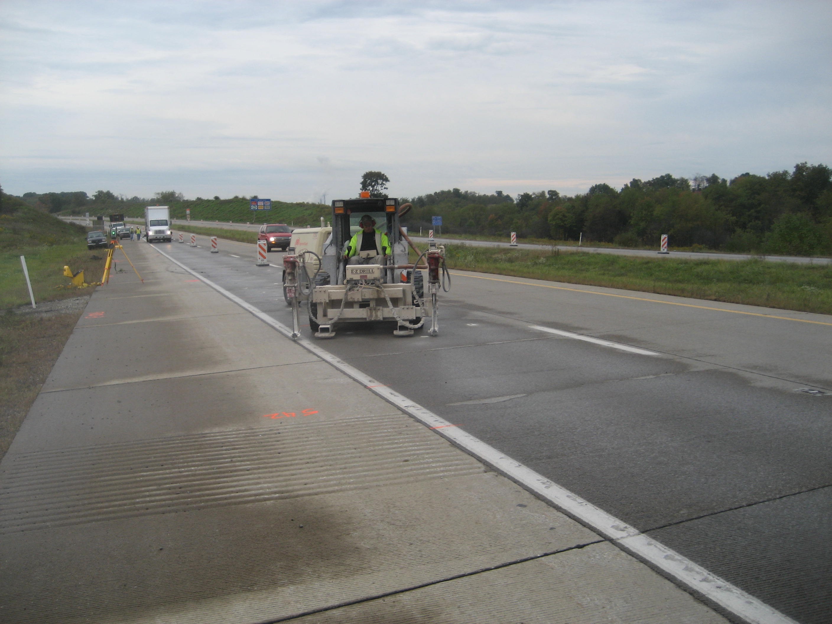 Drilling holes on PCC pavement. From White et al. (2010). Drilling holes on PCC pavement. From White et al. (2010).