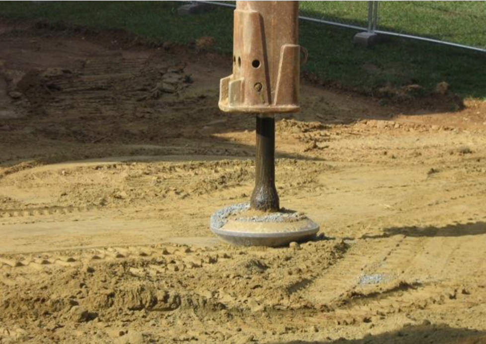 Rammed aggregate pier tamper. (Photograph courtesy of GeoStructures, Inc.) Rammed aggregate pier tamper. (Photograph courtesy of GeoStructures, Inc.)