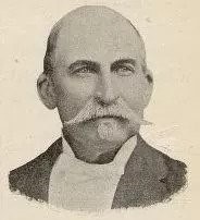 Black and white photograph of Elias Unger. He is bald and has a white mustache.