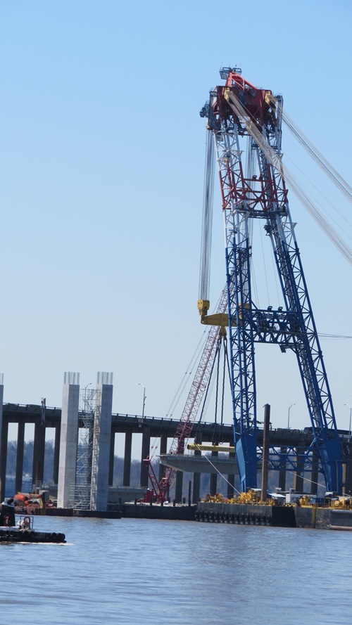 Crane placing cap beam